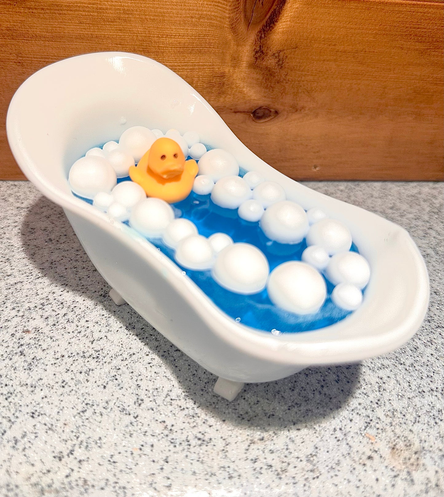Bathtub with water and Duck handmade soap