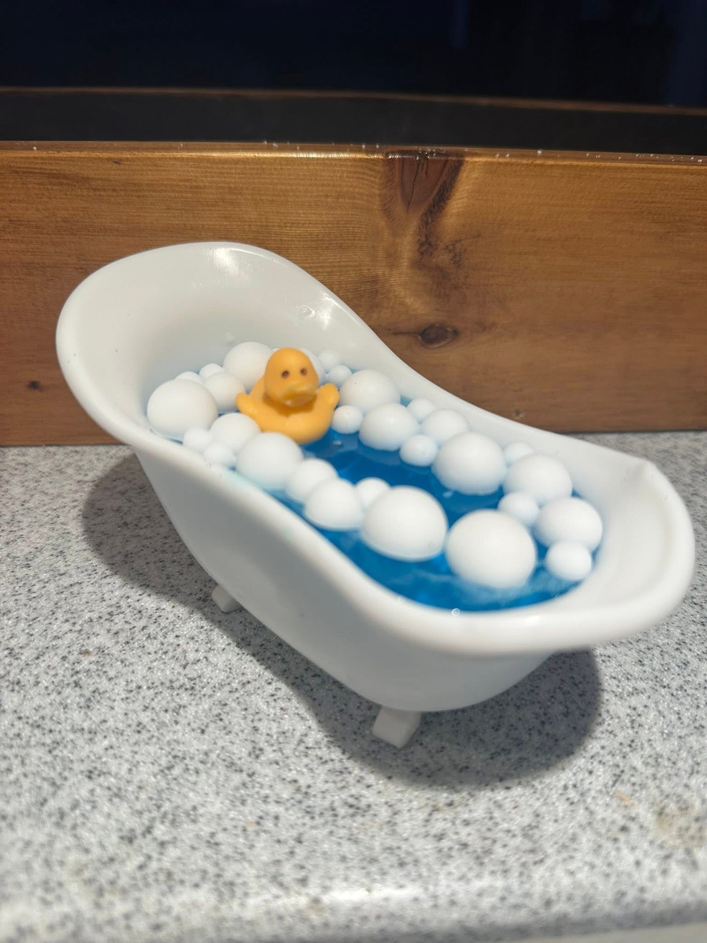 Bathtub with water and Duck handmade soap