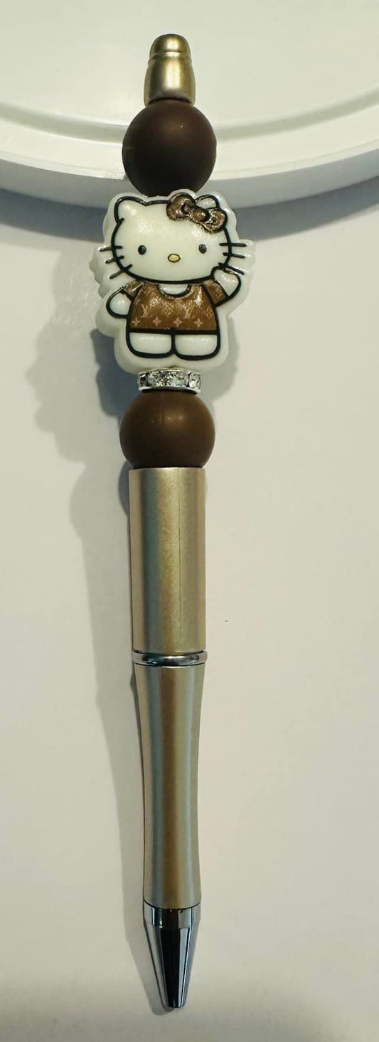 Brown and White HK Beaded Gold Pen