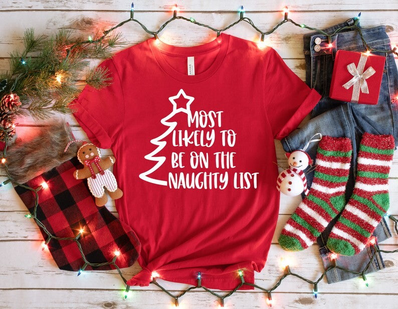 Most Likely to be bn the naughty list DTF on T-shirt