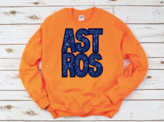 Astros in Blue Faux Glitter DTF on Orange Sweatshirt
